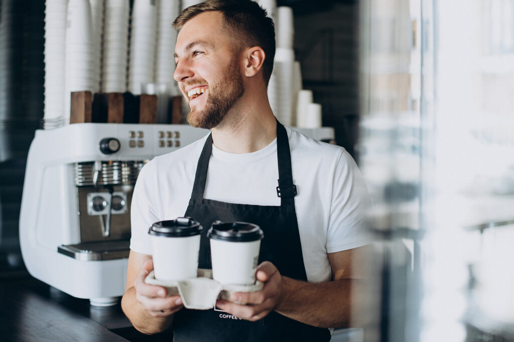Male barista with take away coffee barista01